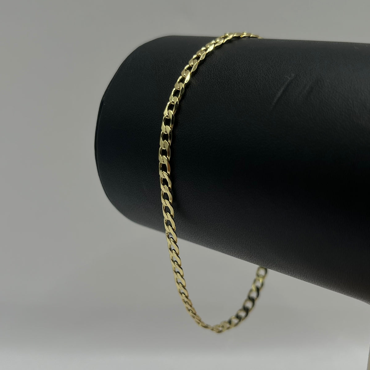 PULSO CURB DELGADO