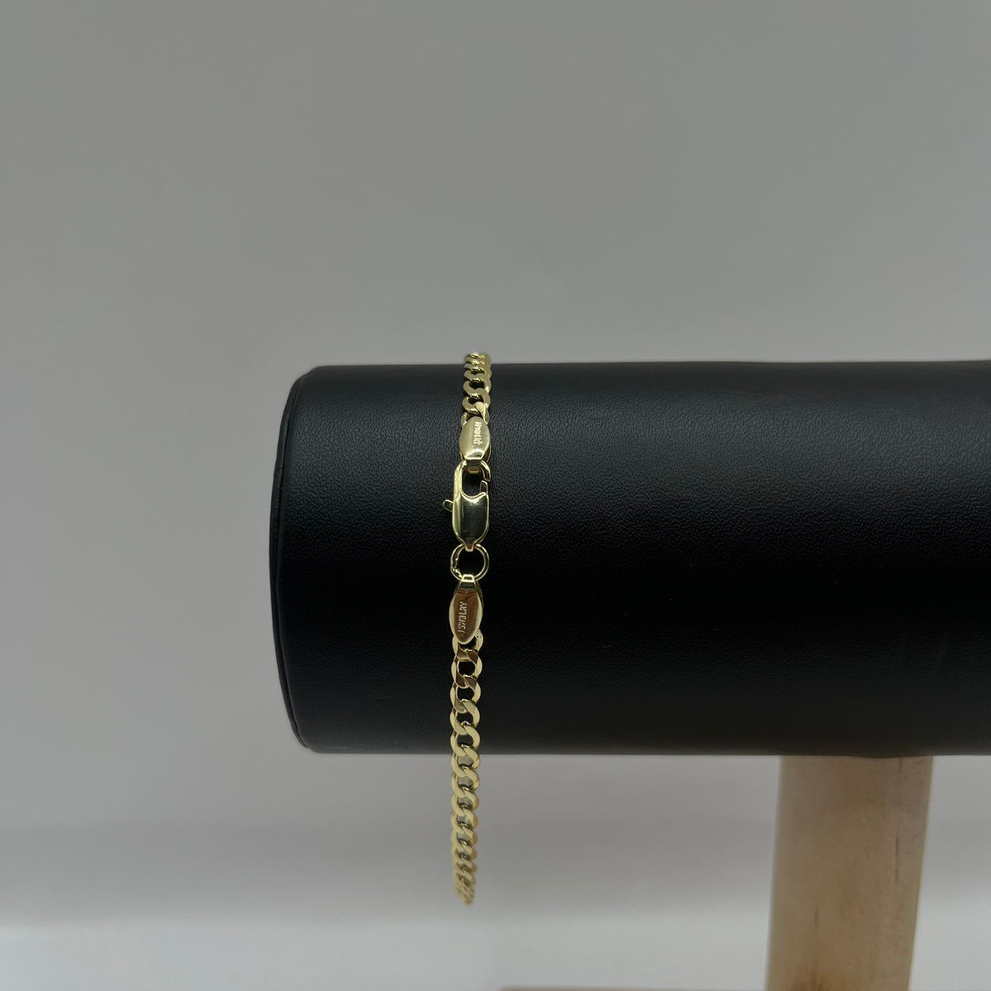PULSO CURB DELGADO • ORO LAMINADO